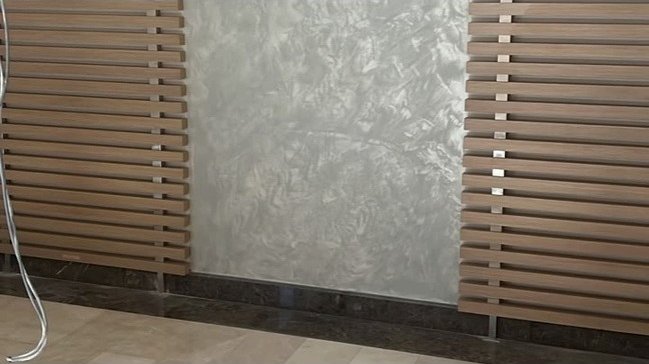 Textured feature wall with wood slat cladding